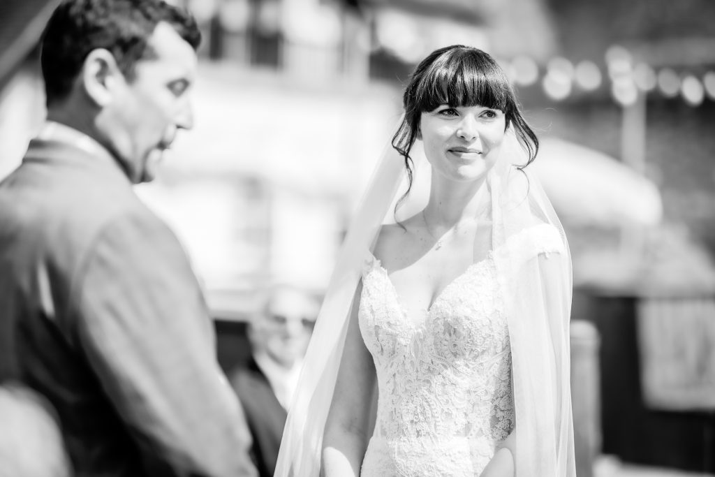 bride and groom during the summer outdoor wedding ceremony