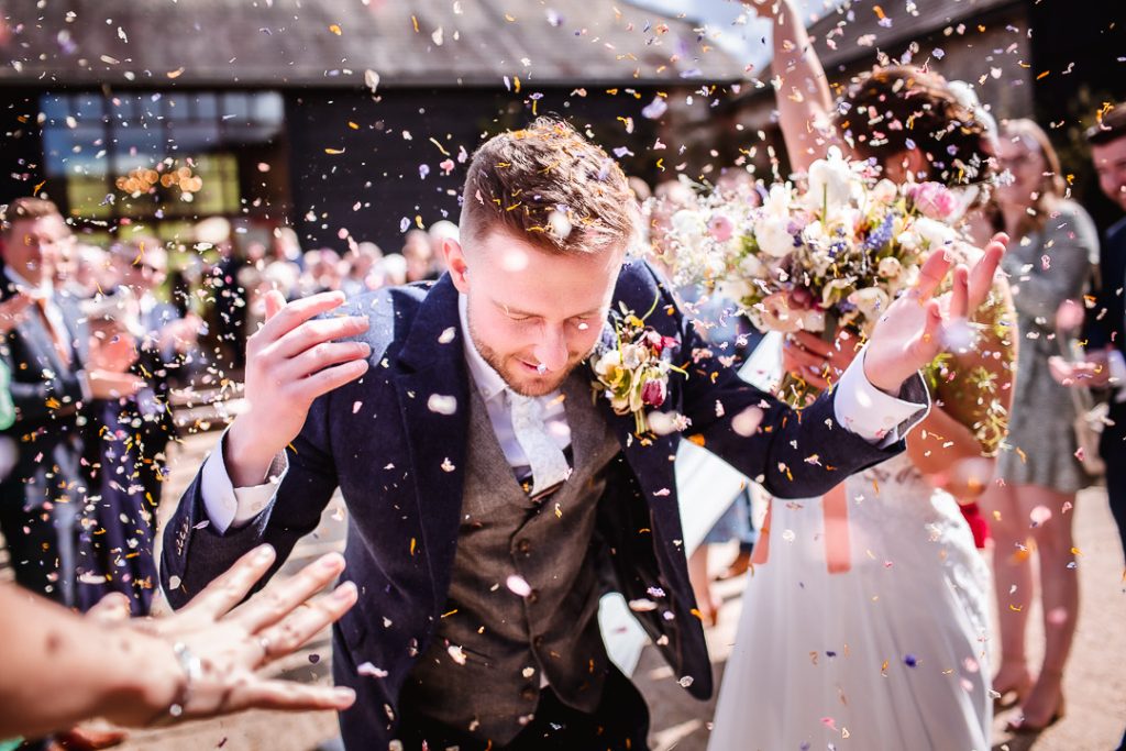 Confetti shot of groom