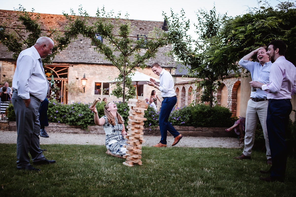 fun photo of wedding guests playing the outdoor games