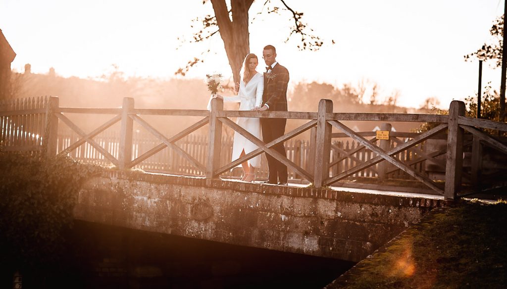 Winter Christmas wedding at Montague Arms Hotel, Beaulieu, New Forest, Hampshire. Sunset wedding image