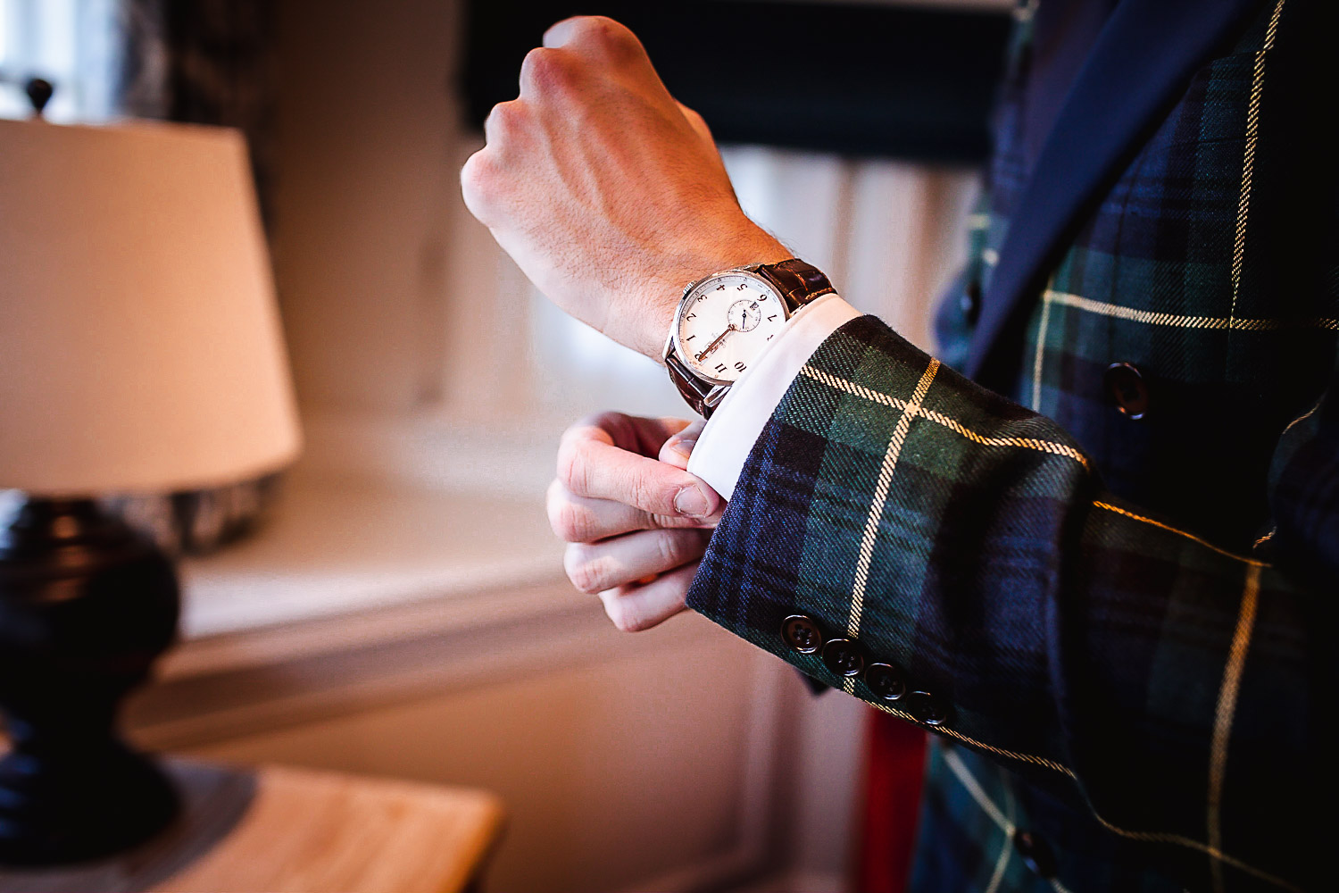 Winter Christmas wedding at Montague Arms Hotel, Beaulieu, New Forest, Hampshire. Groom is getting ready