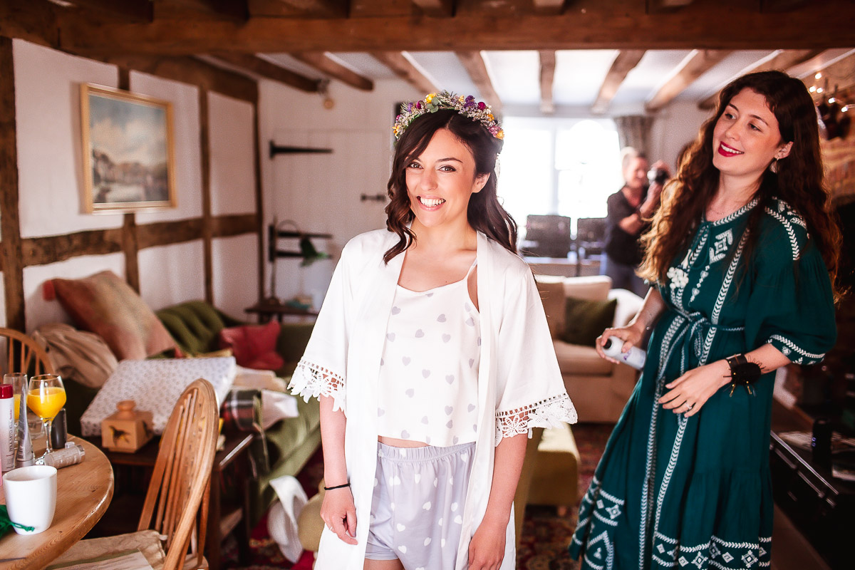 Bride is getting ready in the cottage