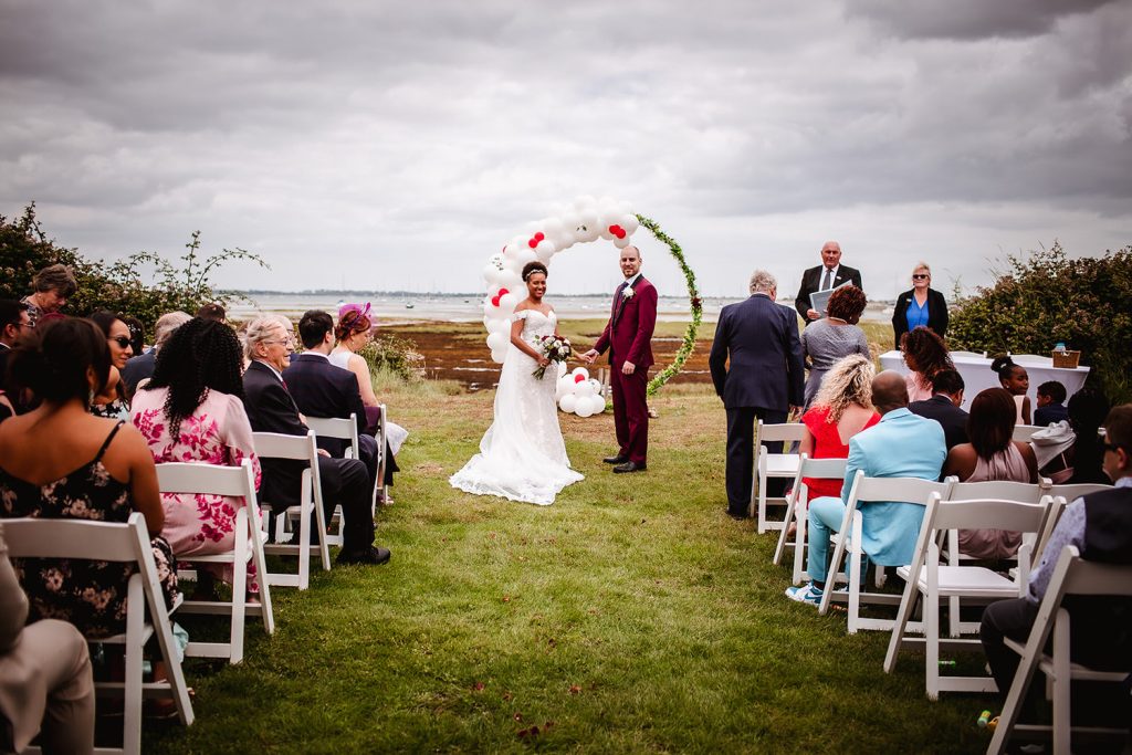 Outdoor wedding ceremony by the sea at Hayling Island, Hampshire wedding photography