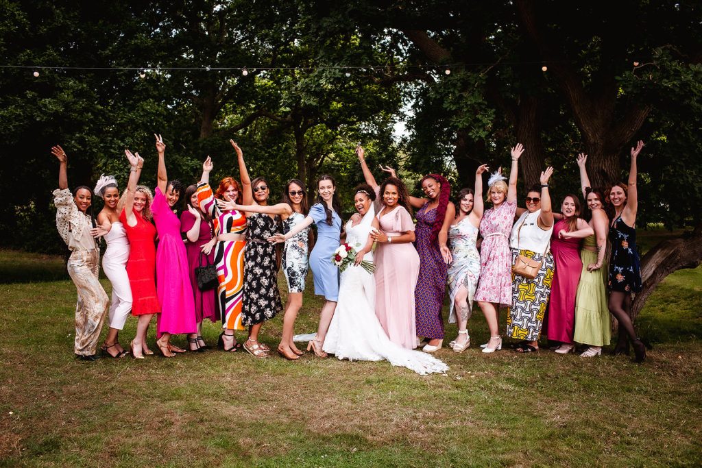 bride with her friends in the forest