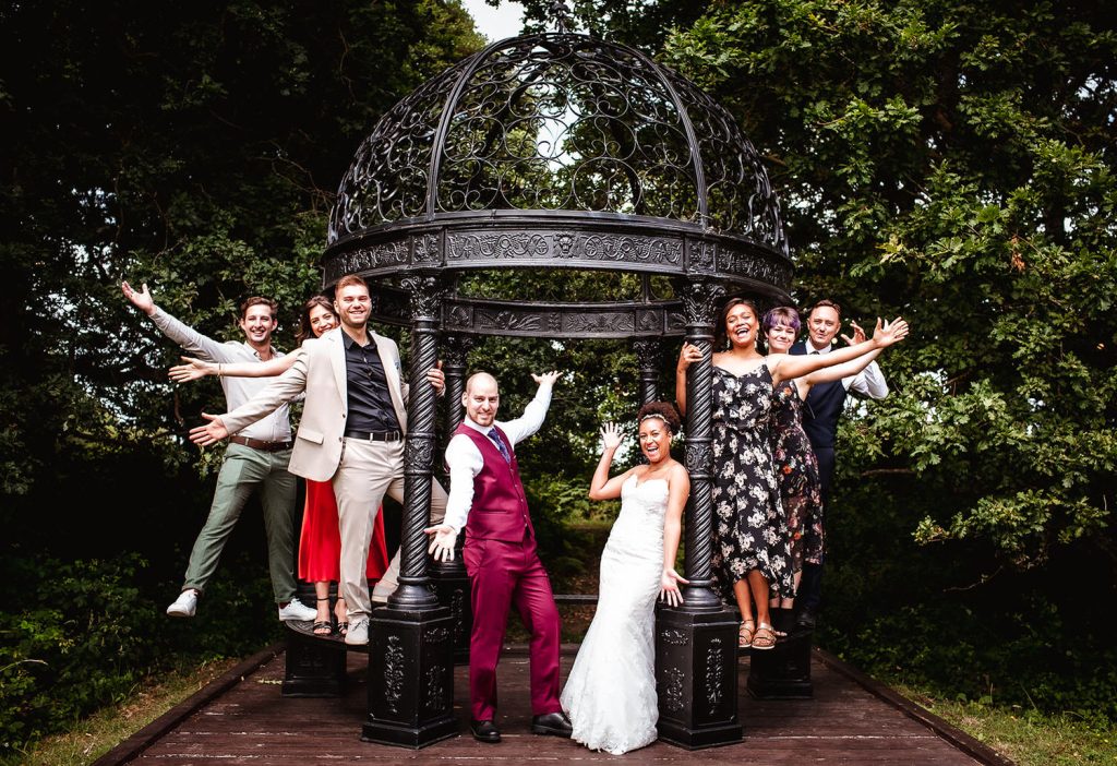 fun photo of bride, groom and their guests at Hampshire wedding venue