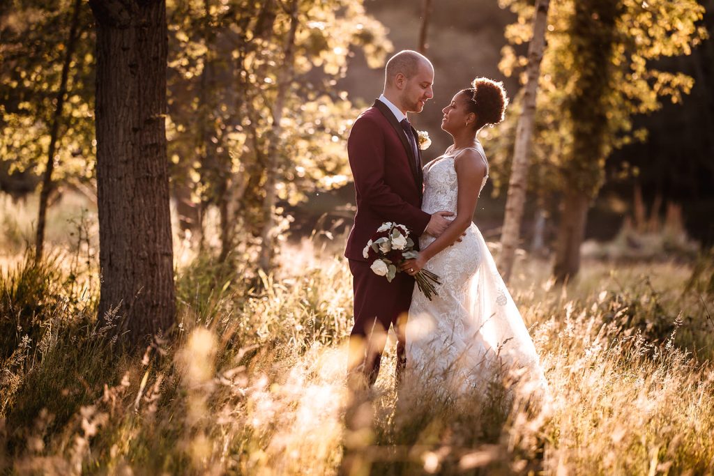 sunset photo of wedding couple in the forest in Hampshire