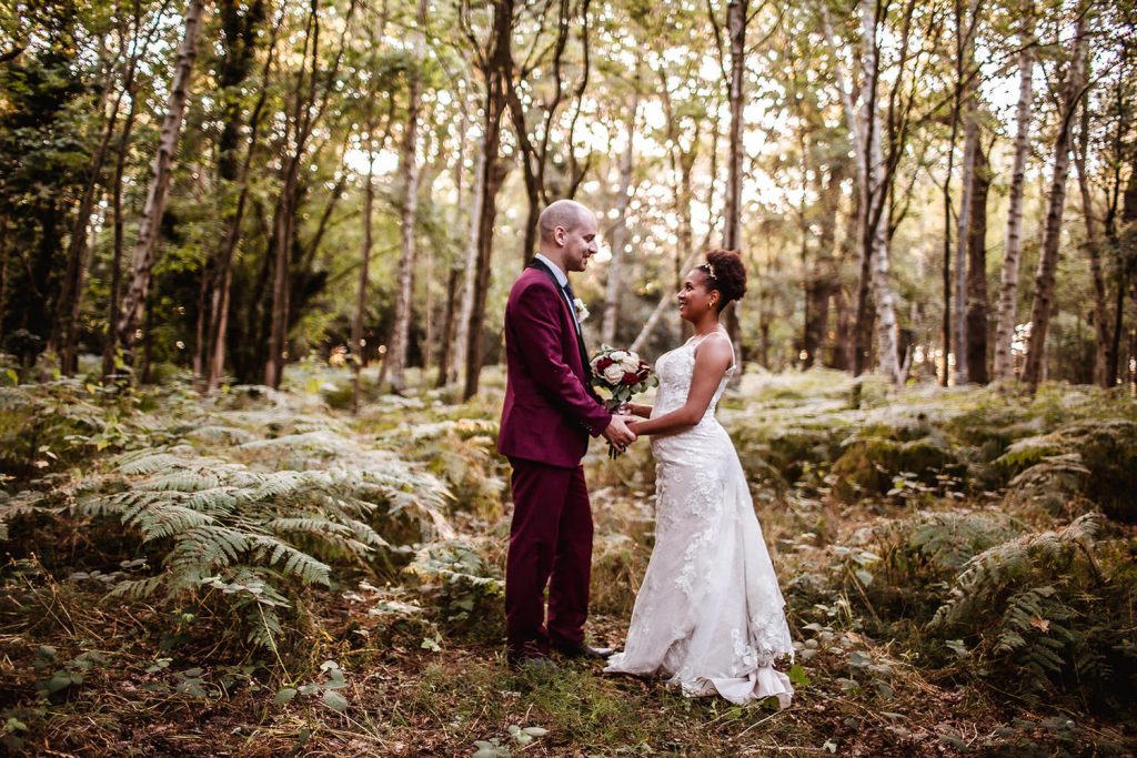 wedding photo of bride and groom in the forest at Tournerbury Woods Estate