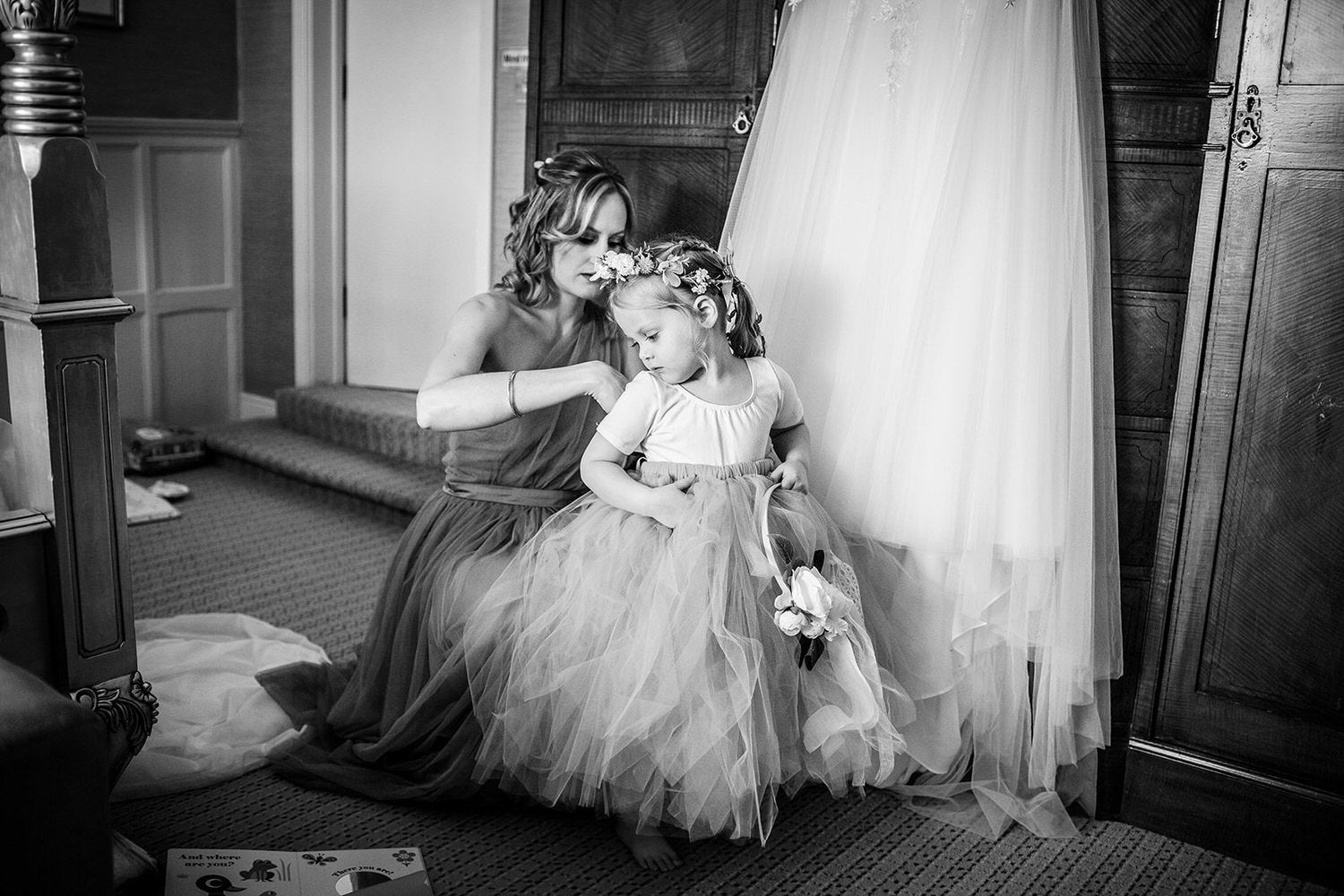 flower girl is getting ready for a wedding