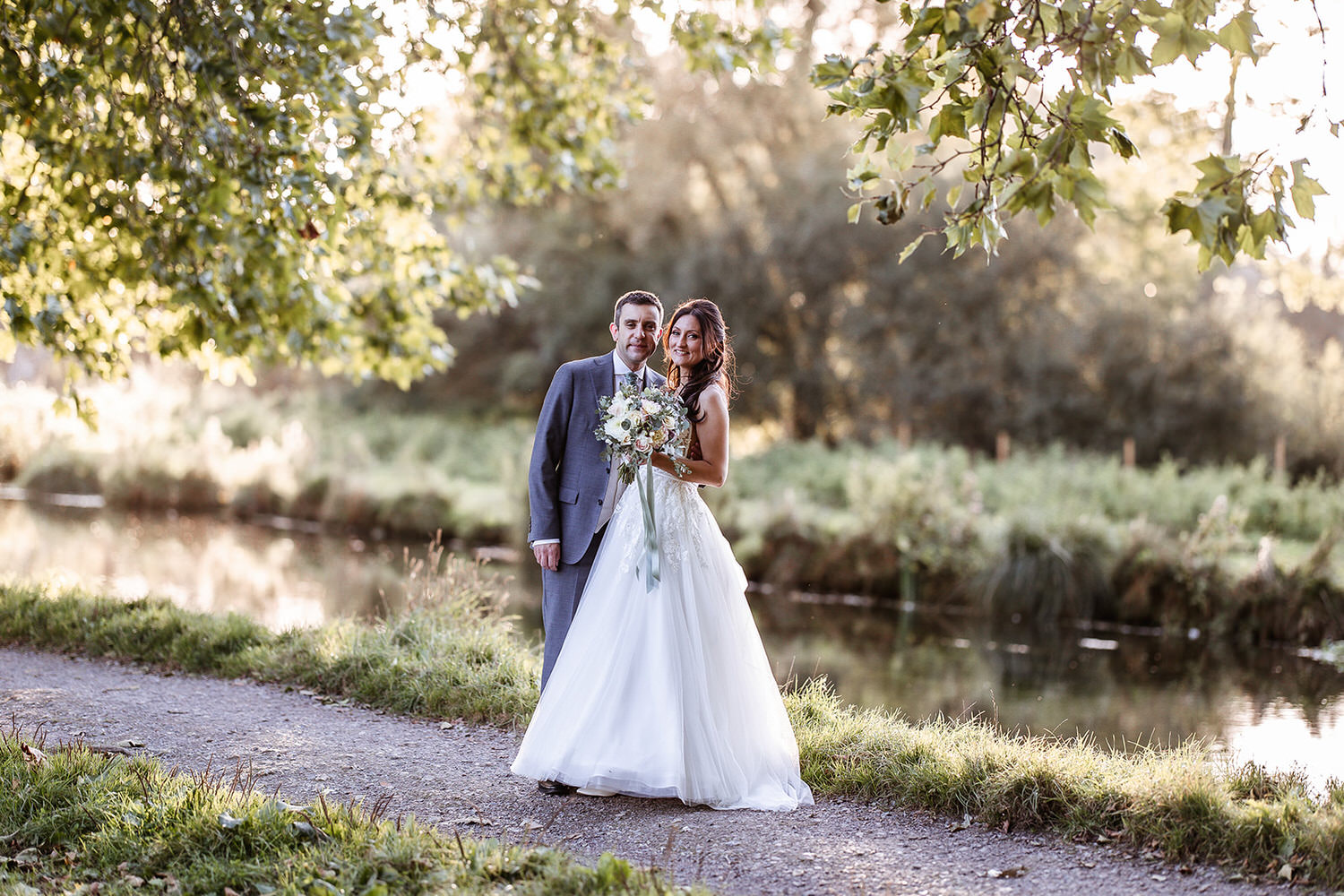 portrait of bride and groom in the park in Winchester. Winchester wedding photography