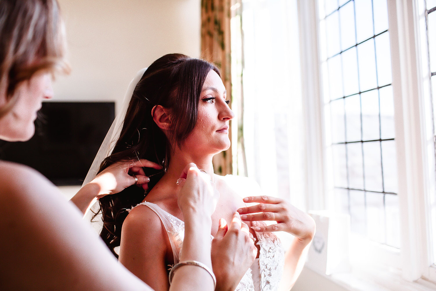 bride is getting ready for her wedding at Hampshire wedding venue Chichester Royal Hotel