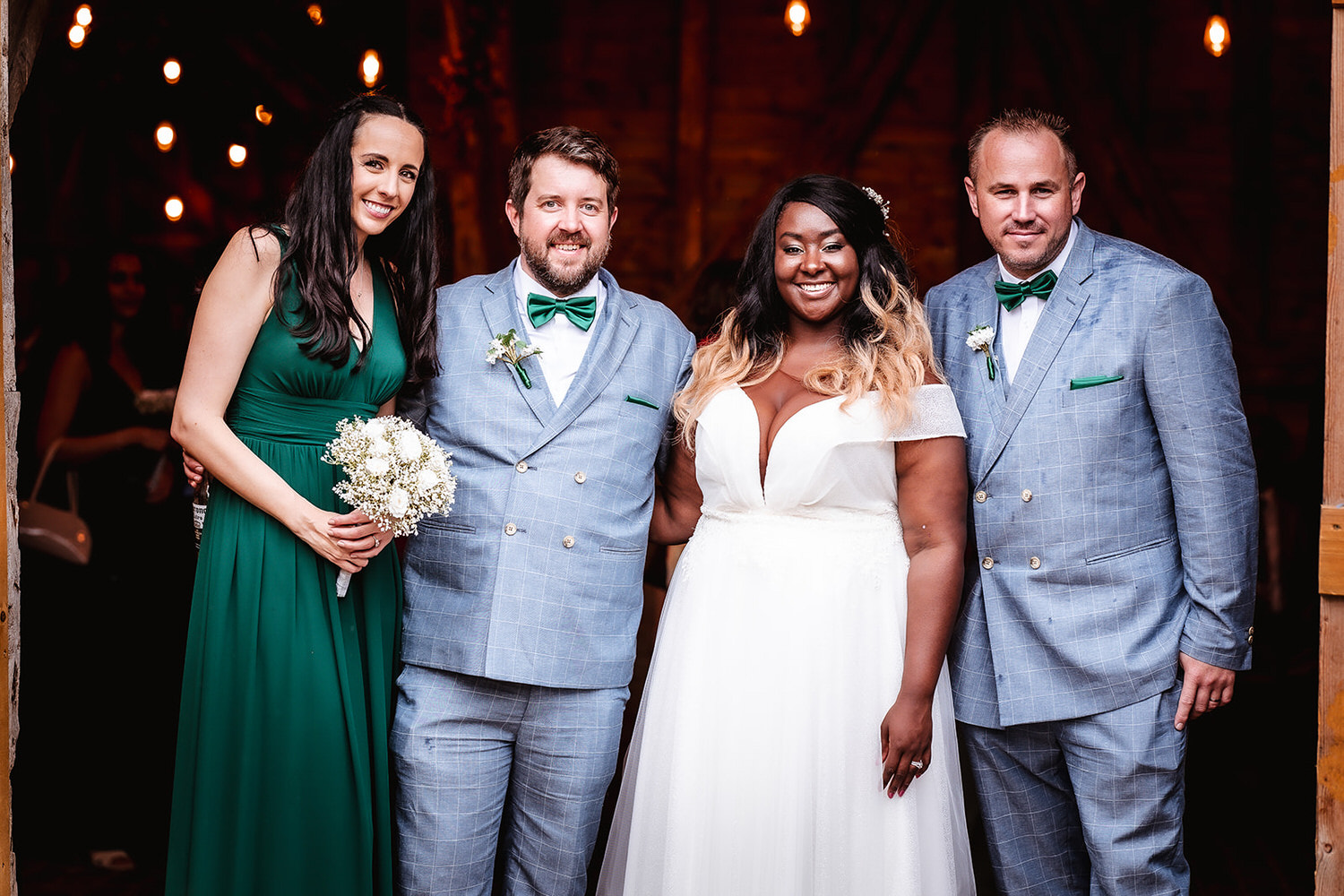 bride and groom photo with their friends High Billinghurst Farm