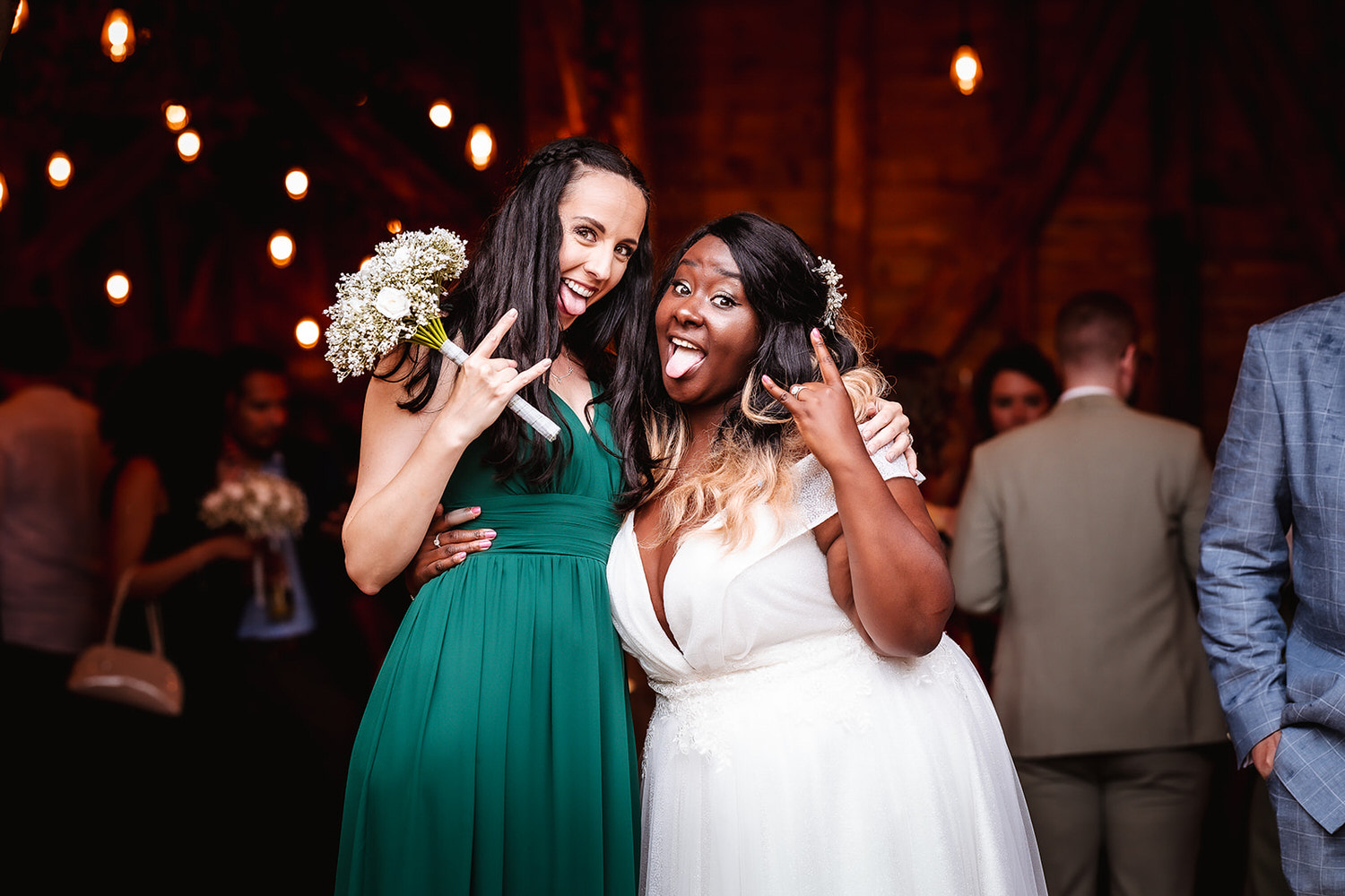 fun, crazy, silly photo of bride and her bridesmaid High Billinghurst Farm