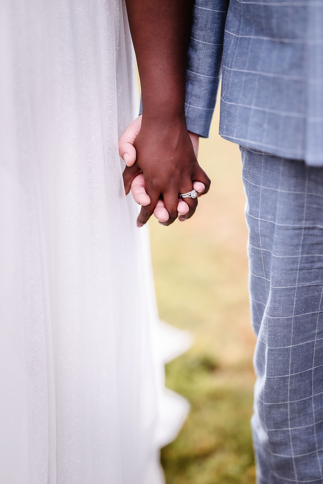 bride and groom holding hands High Billinghurst Farm