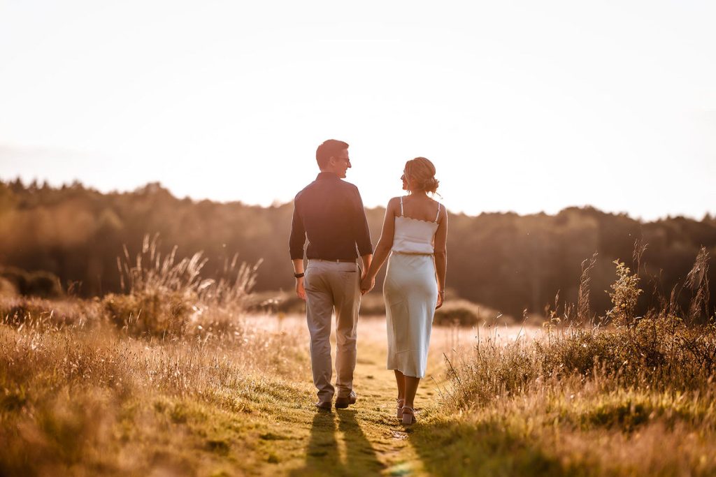 Sunset Hampshire pre wedding photo session in the field. 