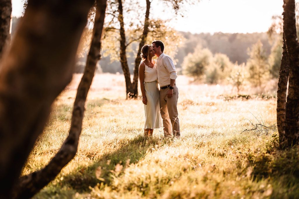 Romantic sunset photo of couple in Petersfield. Petersfield wedding photographer