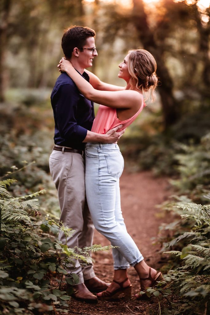 relaxed and fun engagement photo in woods in Hampshire. 