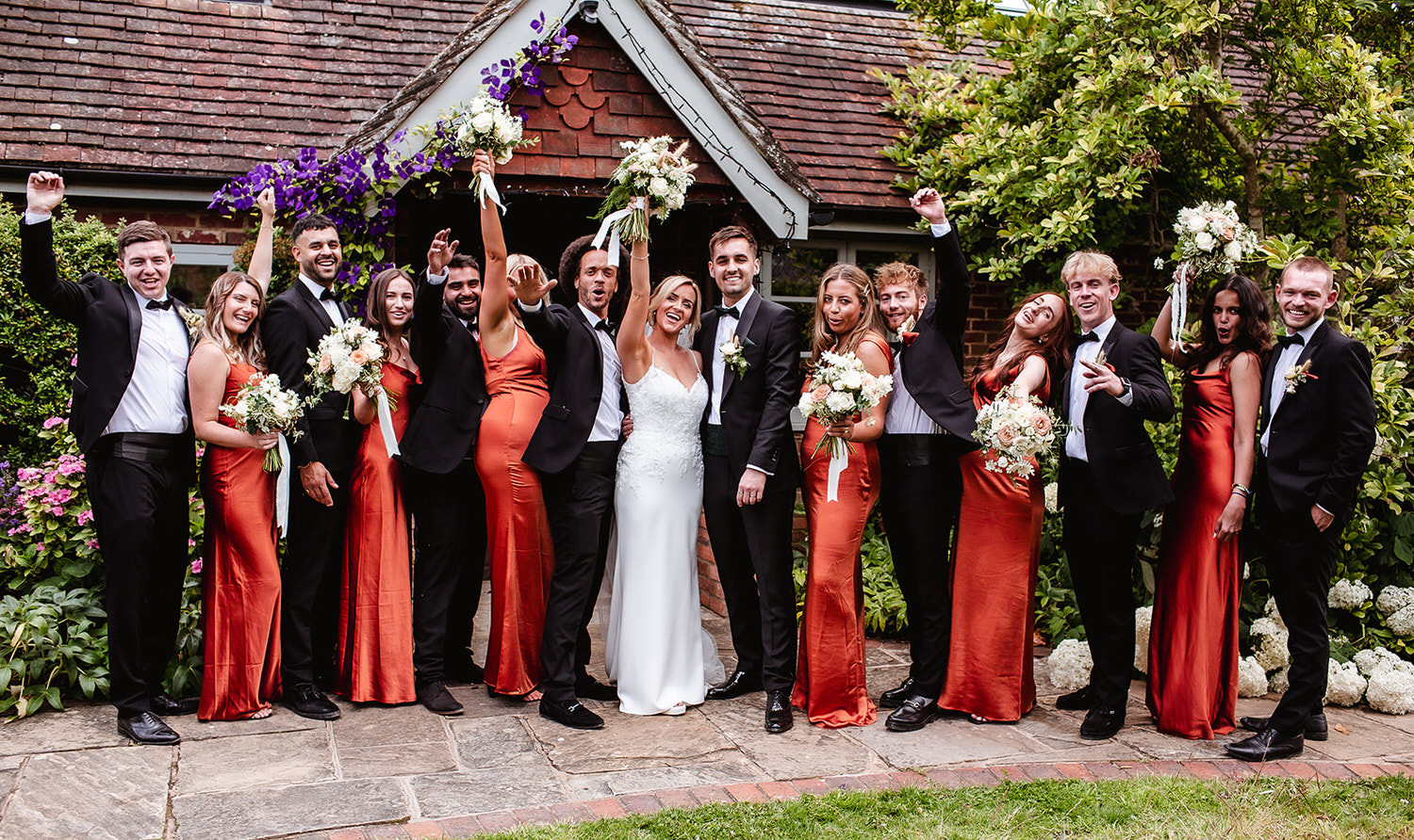 Wedding party fun photo at Gate Street wedding venue in Surrey