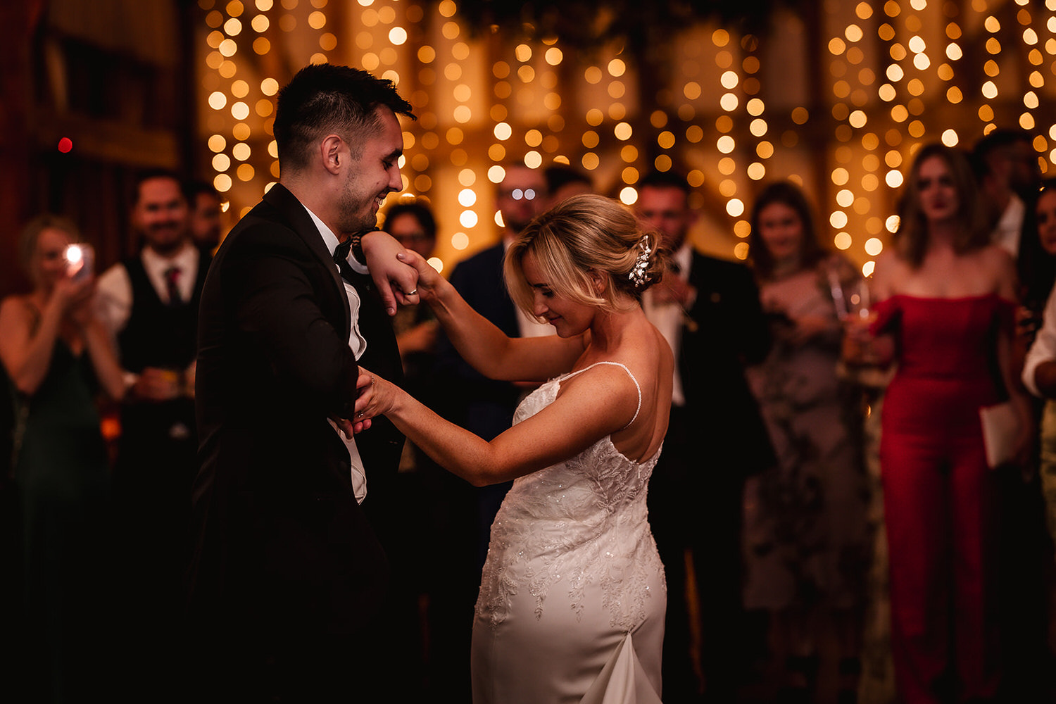 bride and groom dancing at barn in Surrey wedding venue