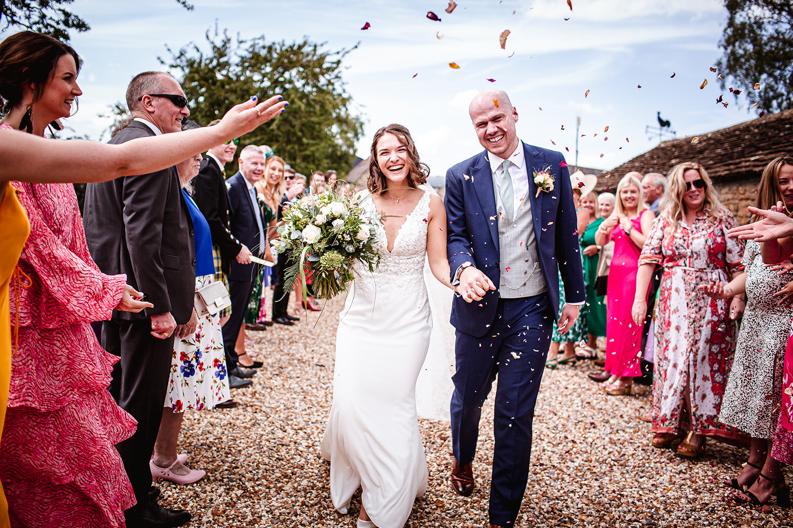 Confetti photo of bride and groom at country wedding venue at Winkworth Farm, malmesbury