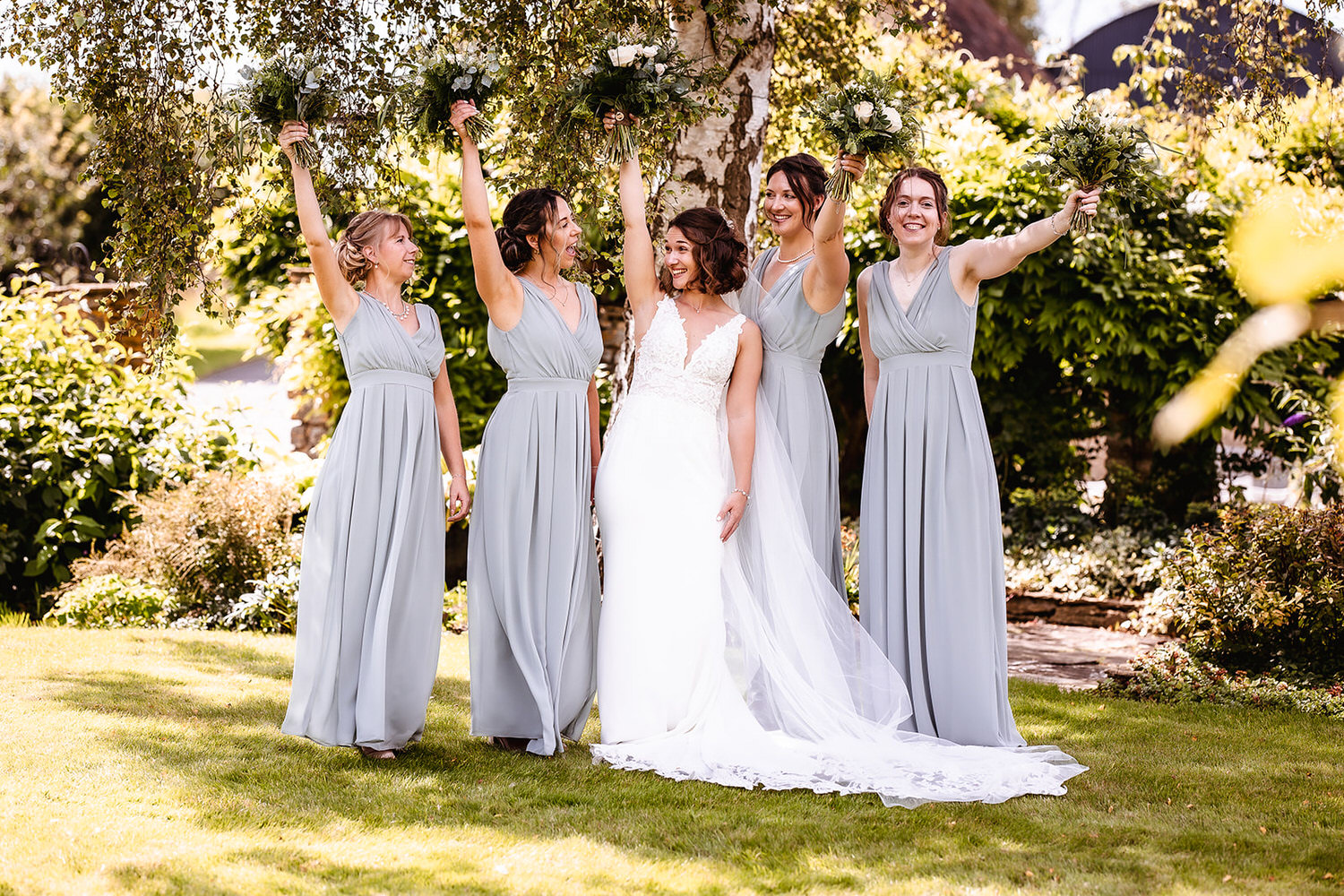 bride and her bridesmaids at Winkworth Farm, Cotswold wedding venue