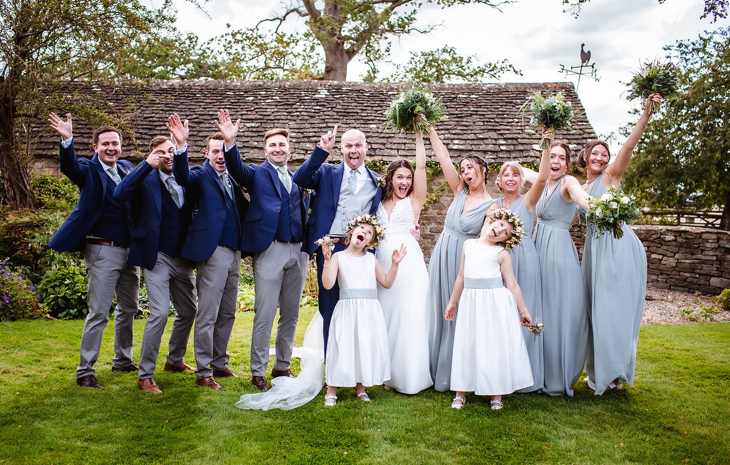 wedding party fun photo outside at Winkworth Farm