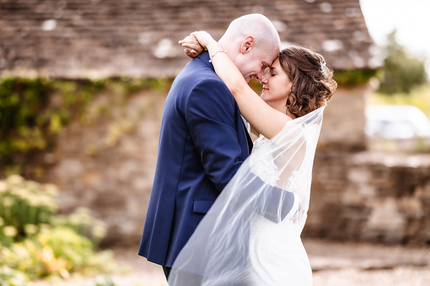 romantic photo of bride and groom Winkworth Farm wedding photographer