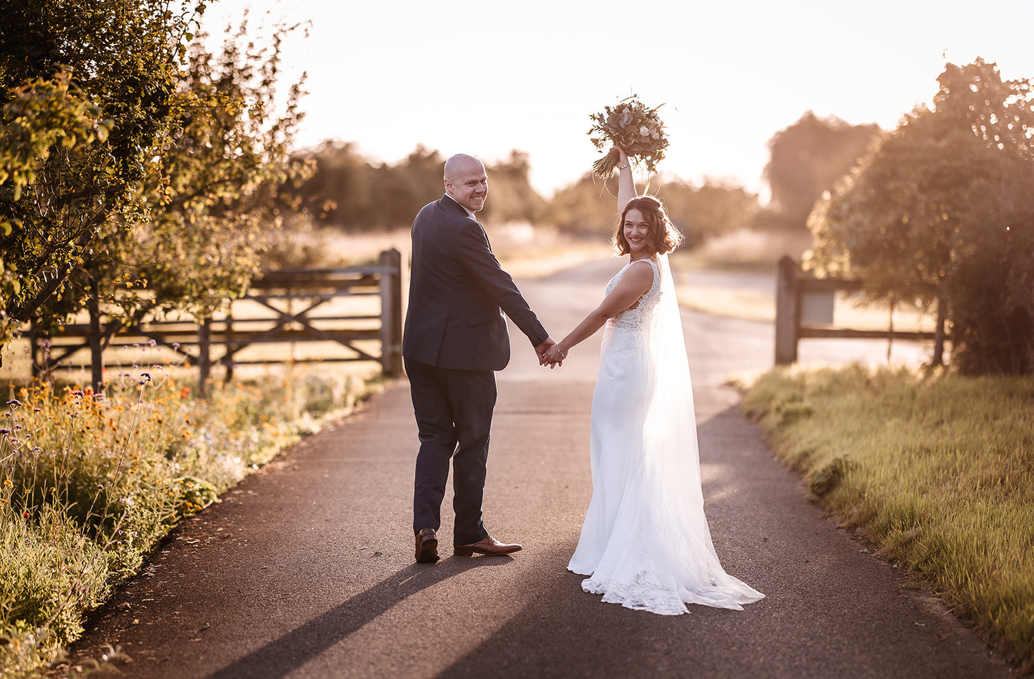 romantic sunset wedding photo at Winkworth Farm