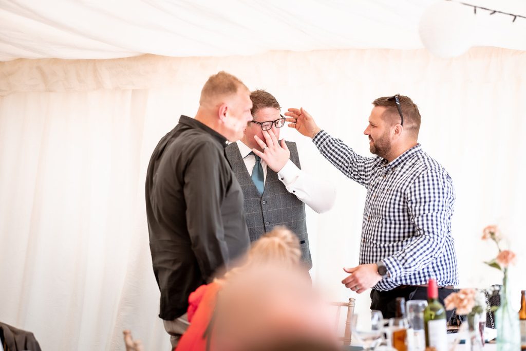 groom emotional tears at Hampshire wedding. 