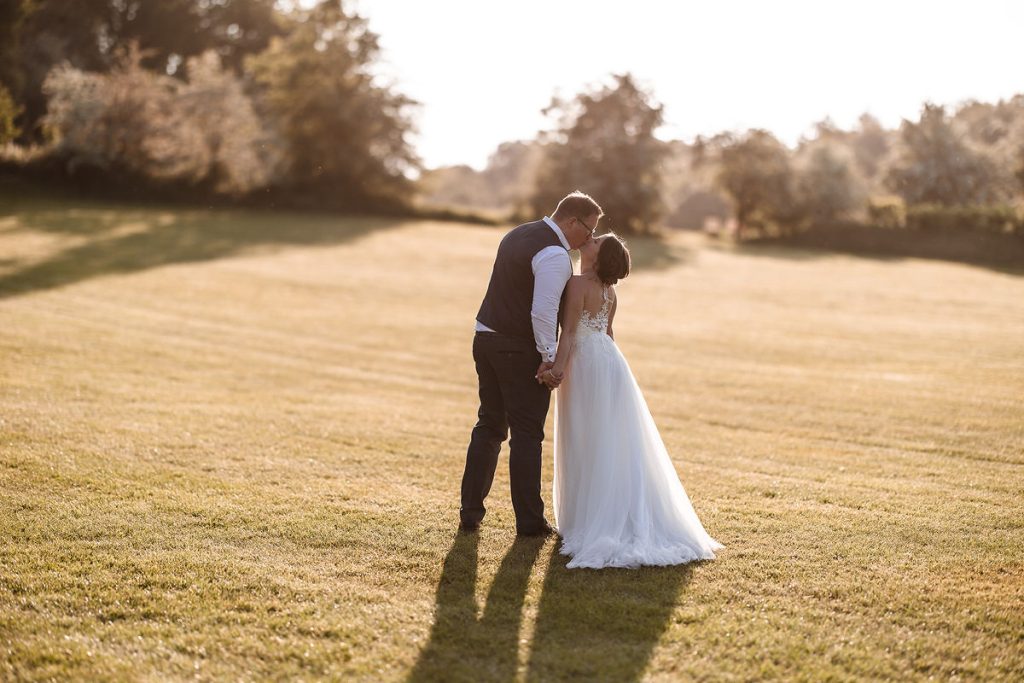 sunset wedding photography in the field at Departure Lounge, Alton, Hampshire