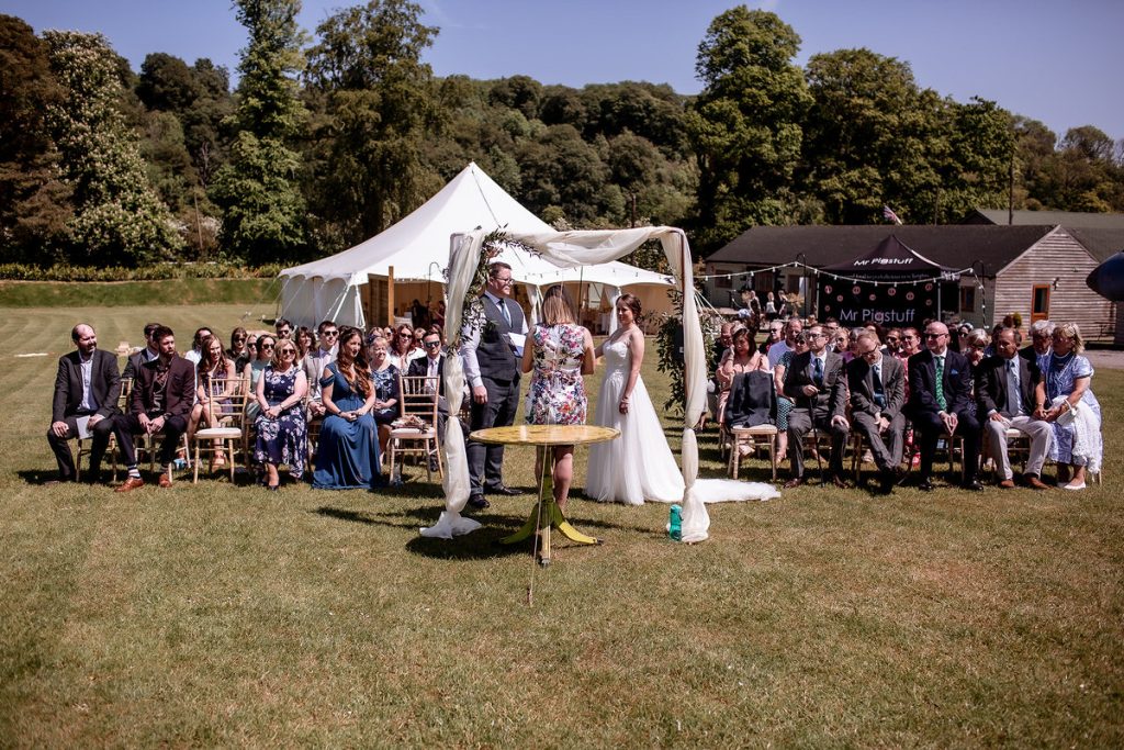 summer wedding at outdoor venue in the field. Marquee wedding in Alton, Hampshire