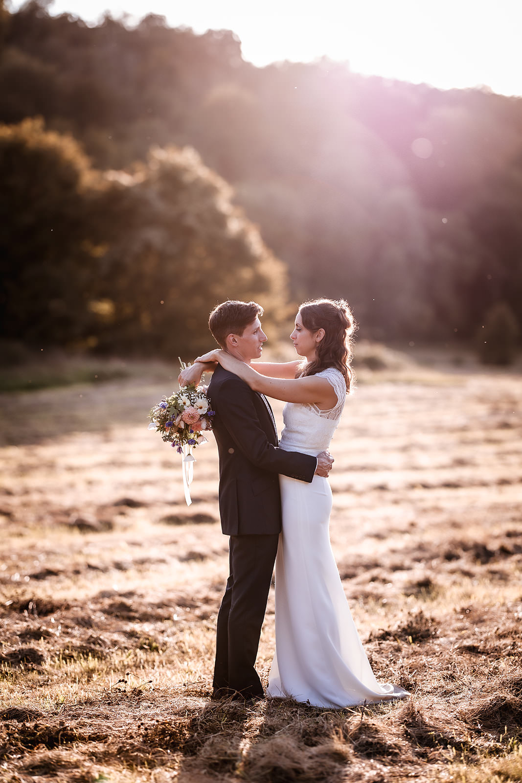 romantic and magical wedding photo of bride and groom during the sunset. Hampshire natural wedding photographer