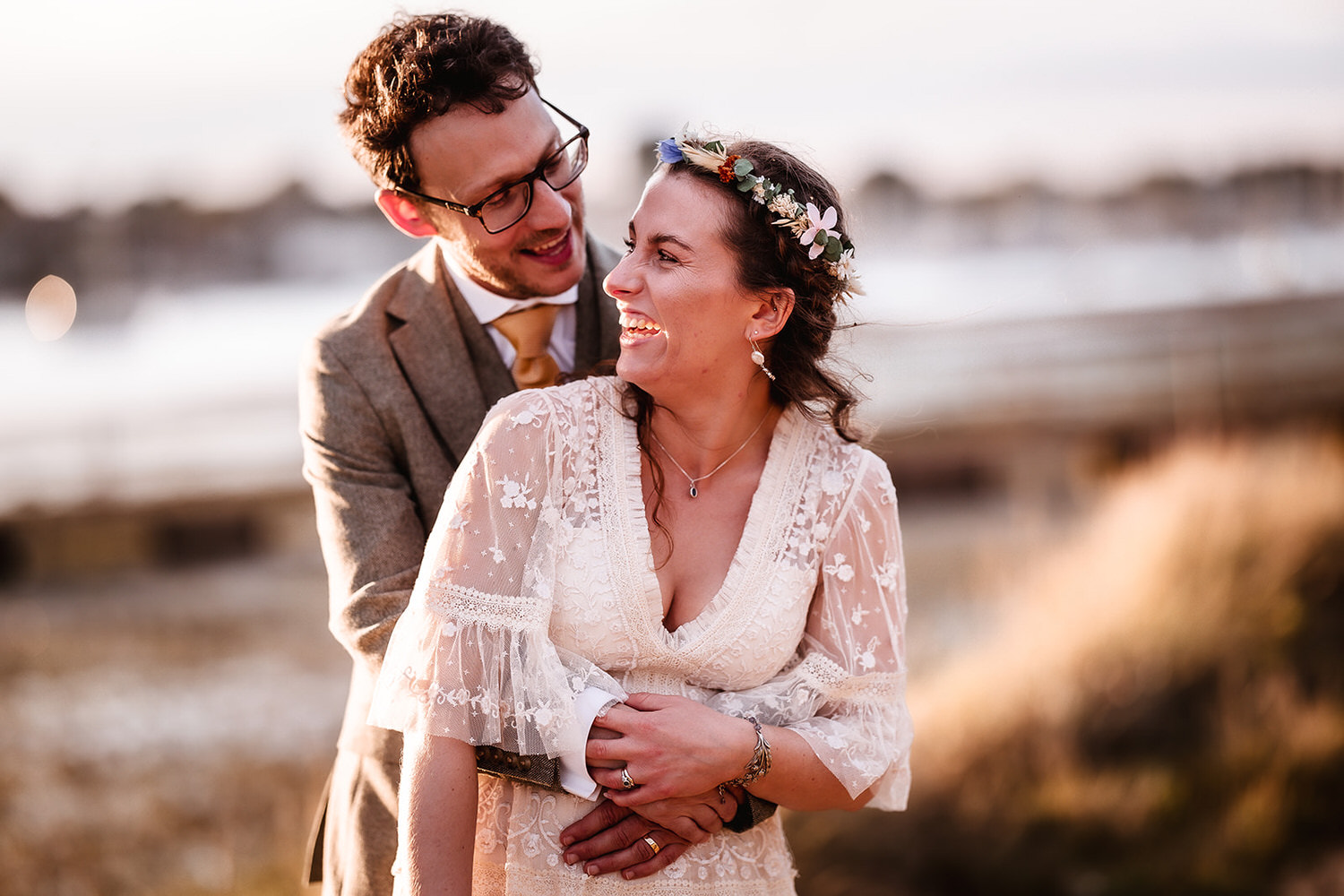 bride and groom giggling and looking at each other at Harbour. Hampshire wedding photographer