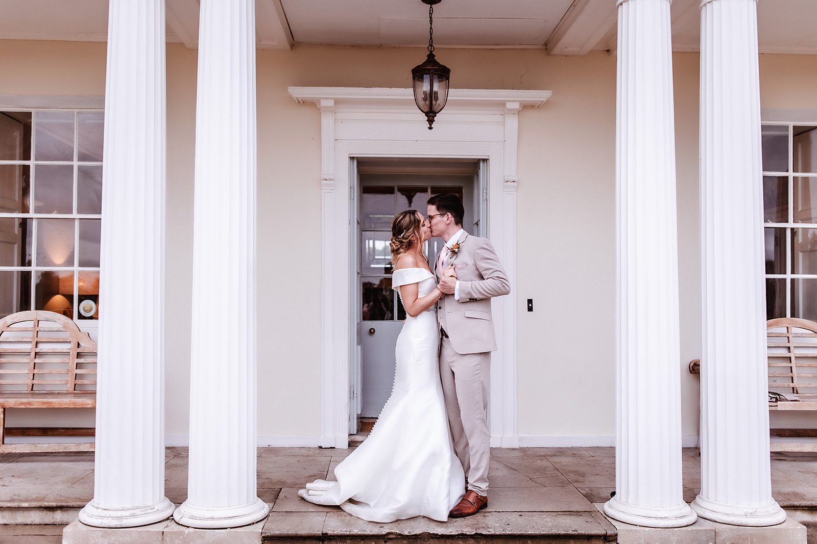 bride and groom dancing outside of their wedding venue