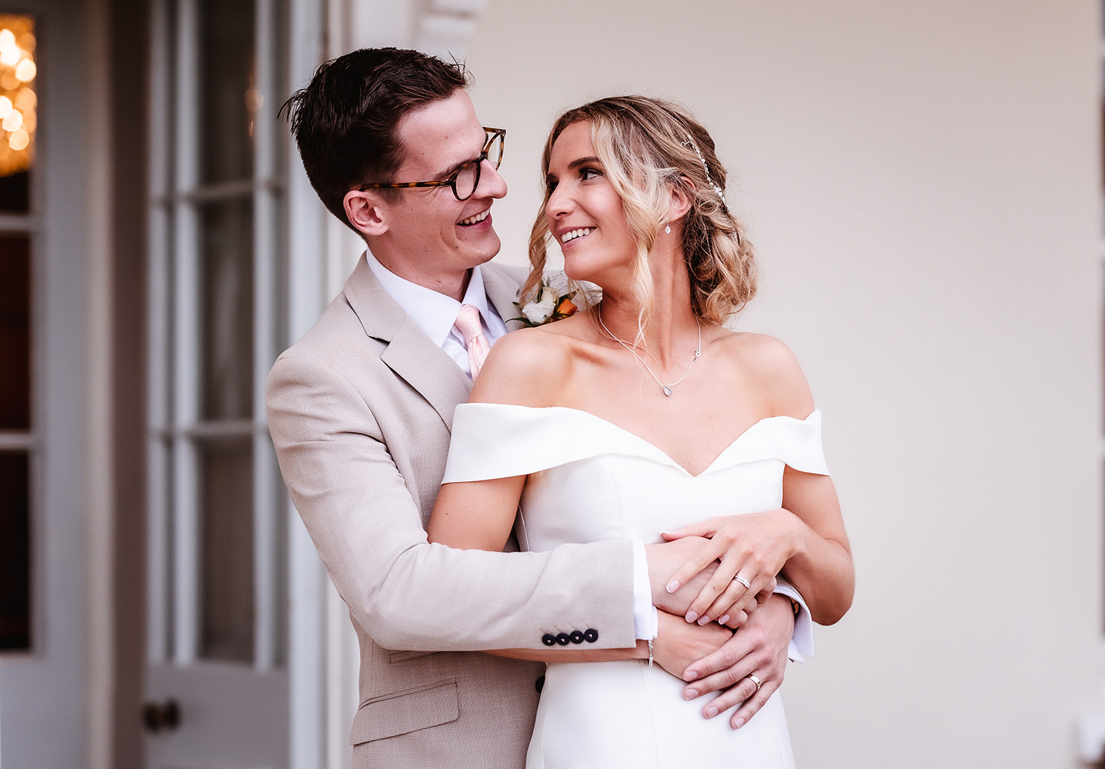 natural photo of bride and groom looking at each other