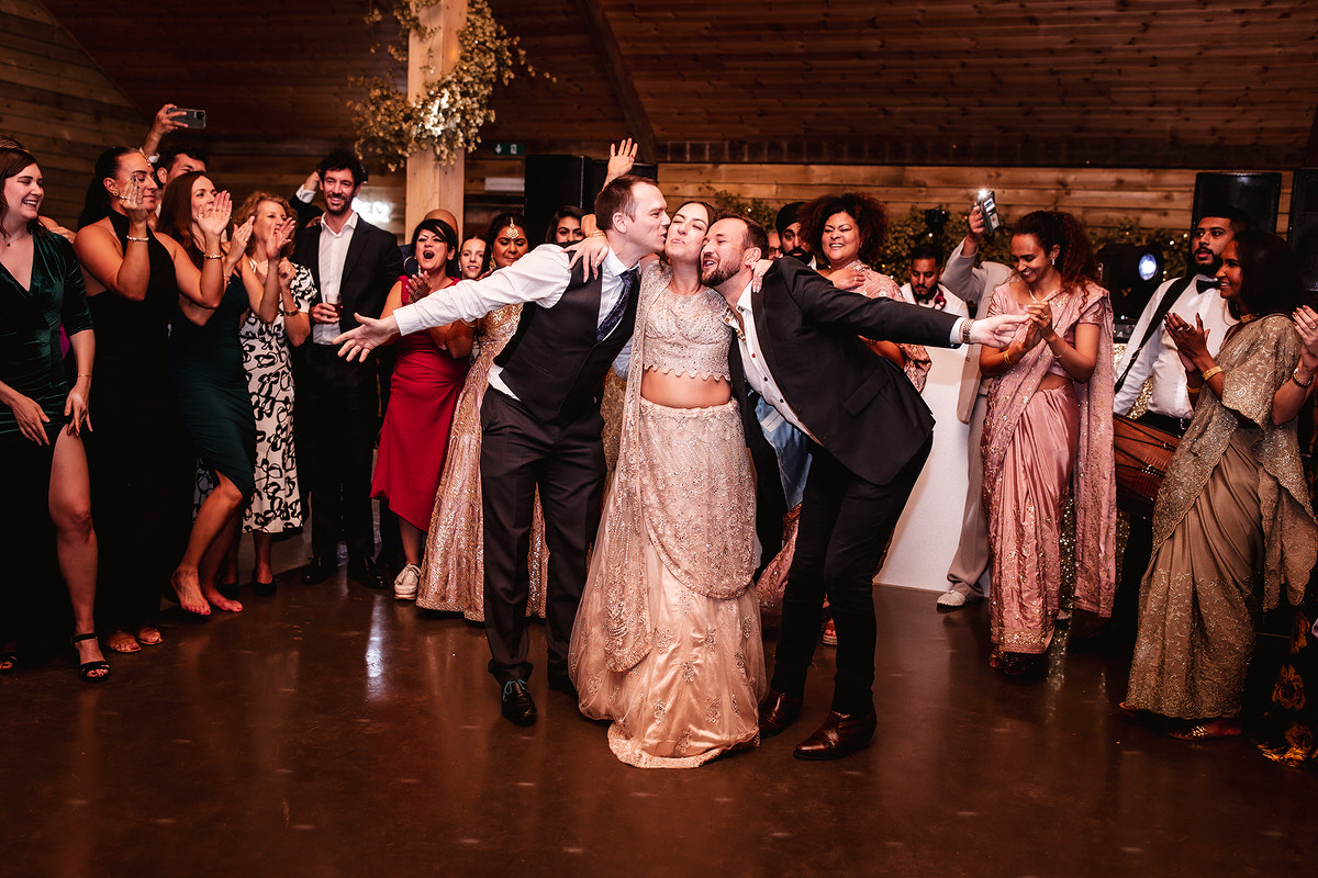 surprised indian wedding dance for her groom. Bride is dancing with her friends and bridesmaids at her Indian wedding