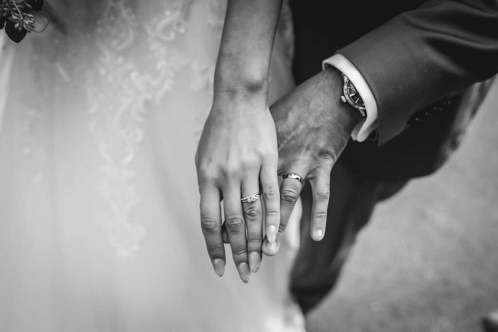 bride and groom's hand with the wedding rings