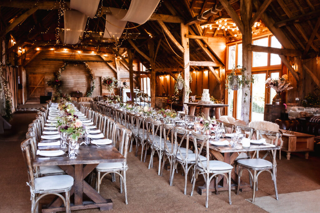 decorated wedding reception room at rustic Wiltshire Bowerchalke Barn