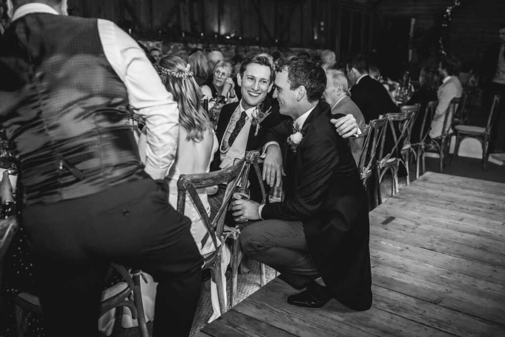 groom with his best man during the wedding reception