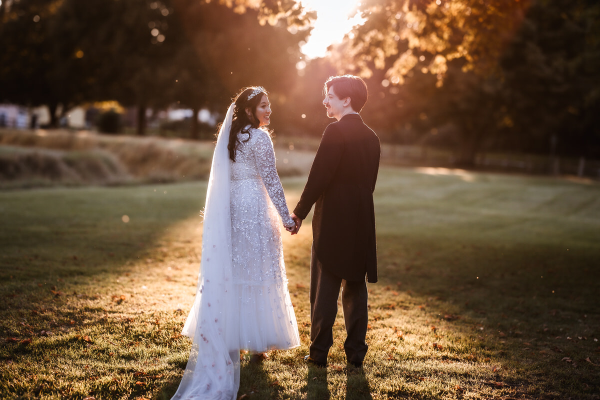 Sunset photo of bride and groom captured by Hampshire wedding photographer