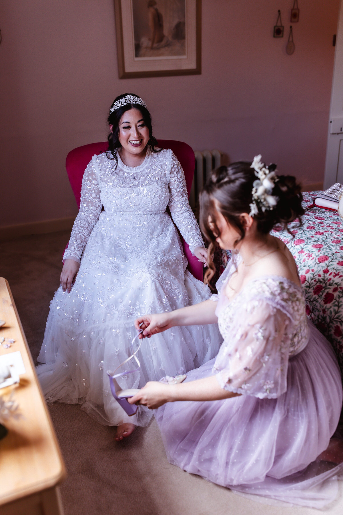 bride is getting ready and putting her shoes on