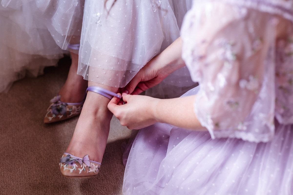 bride and her wedding shoes